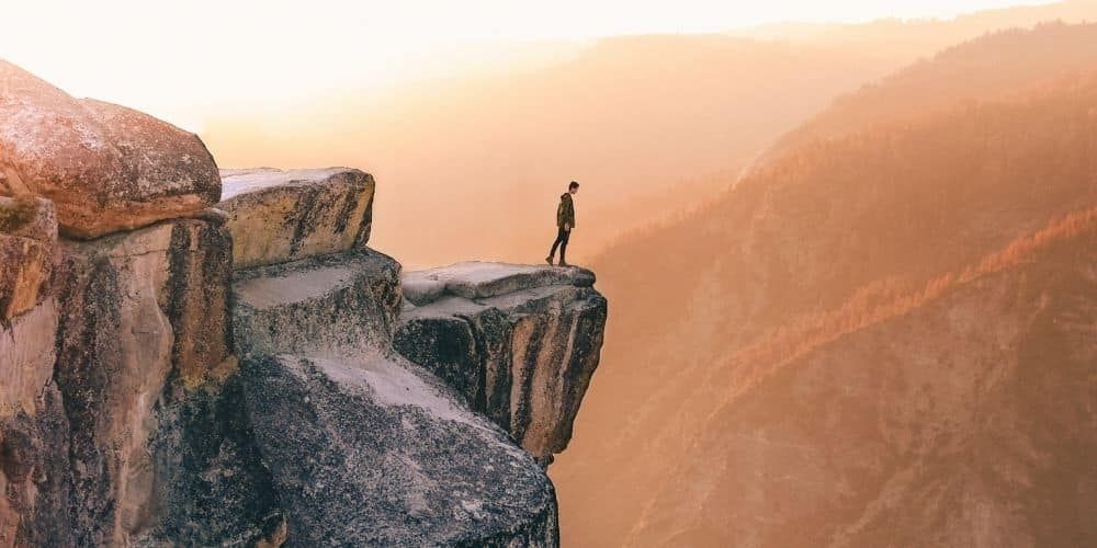 Man on the edge of a cliff.