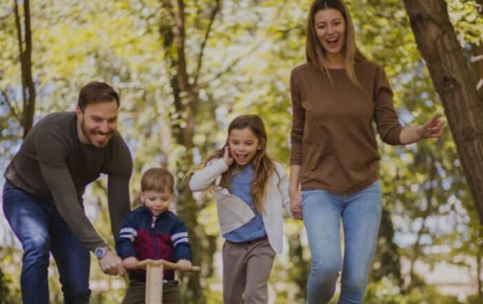 how to disciple your family, family experiences, father and family spending good time together, kids on a bike