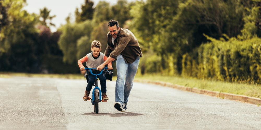 father and son; bike riding; single dad