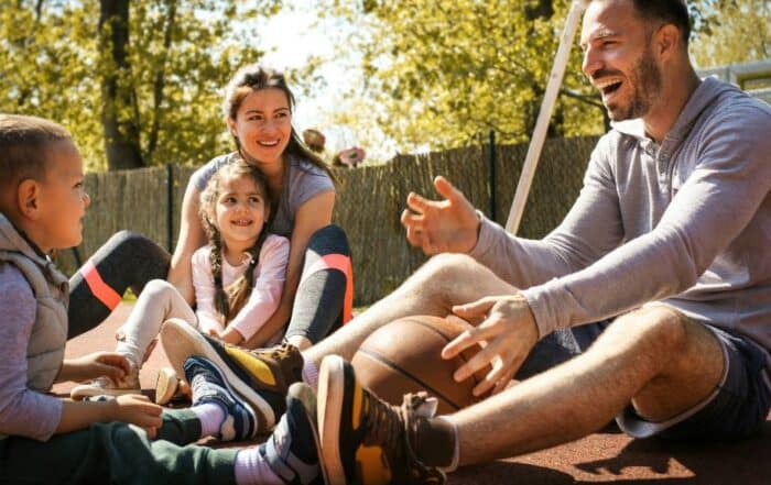 father talking to kids