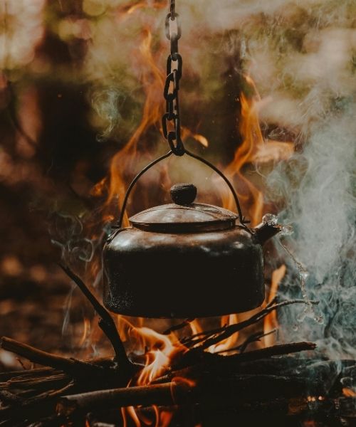 Godly dad guiding his son on a mountain path