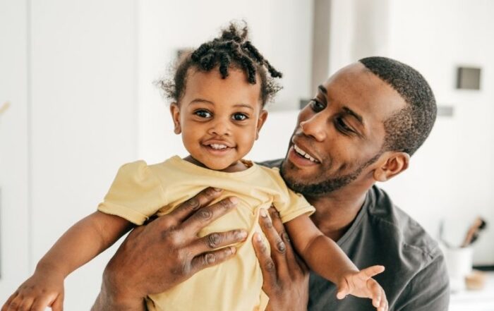 Dad with his happy daughter.